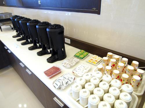 a counter with a bunch of food on a table at Toyoko Inn Cebu in Cebu City