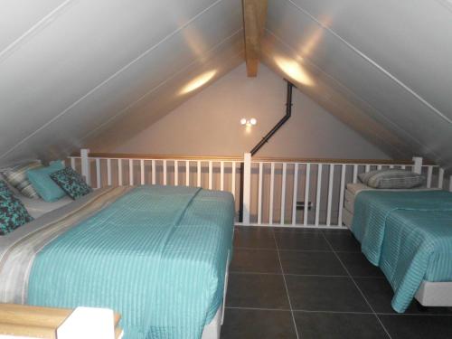 Säng eller sängar i ett rum på Vakantiewoning 't Blooteland