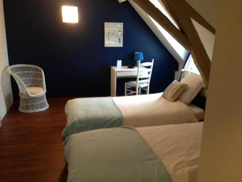 Katil atau katil-katil dalam bilik di chambres d'hotes saint hubert