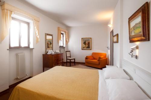 Postel nebo postele na pokoji v ubytování Hotel Porta Romana di Luce Hotels
