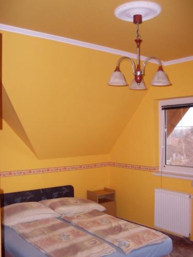 Postel nebo postele na pokoji v ubytování Lala Apartmanok
