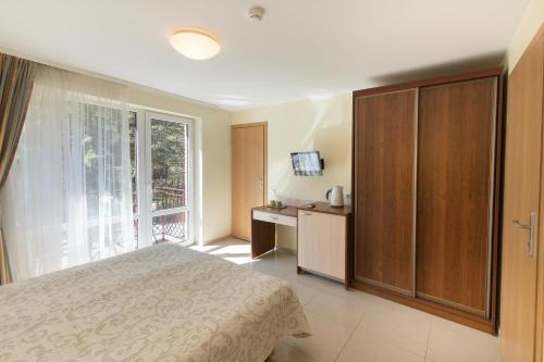 Llit o llits en una habitació de Vila Medus