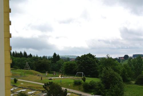 a view of a park with a playground at Ferienwohnung Harz-Flair 264 in Hohegeiß