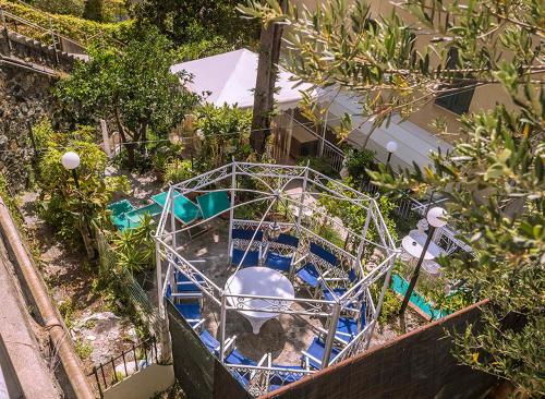 an overhead view of a garden with a spiderweb at Bed and Breakfast Gioiello in Celle Ligure