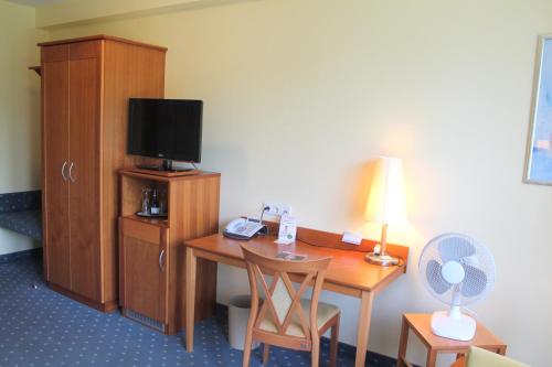 Μια τηλεόραση ή/και κέντρο ψυχαγωγίας στο Hotel und Restaurant Eurohof