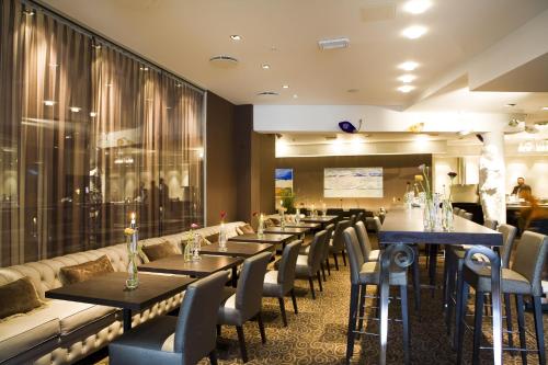 Restoranas ar kita vieta pavalgyti apgyvendinimo įstaigoje Clarion Collection Hotel Havnekontoret