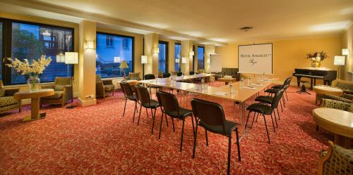 a conference room with a long table and chairs at Angelis in Prague