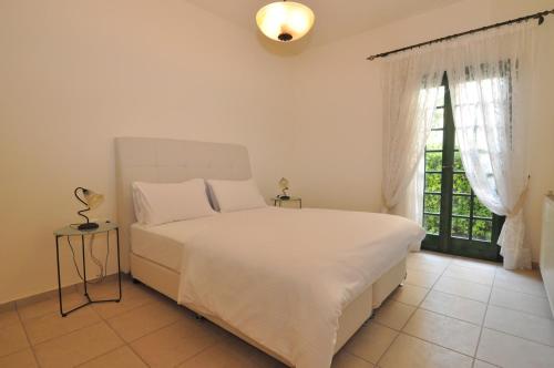 Posteľ alebo postele v izbe v ubytovaní Ocean Village Apartments