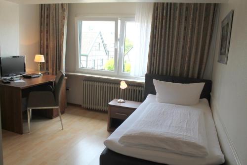 Кровать или кровати в номере Haus Kastanienhof