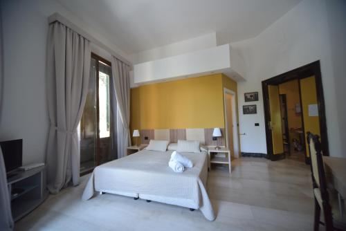 Postel nebo postele na pokoji v ubytování B&B Del Duomo
