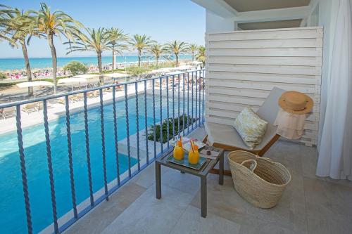 a balcony with a view of a swimming pool at Myseahouse Flamingo - Adults Only 4* Sup in Playa de Palma