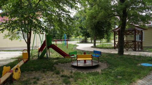 a park with a playground with a slide at Взлет in Gelendzhik