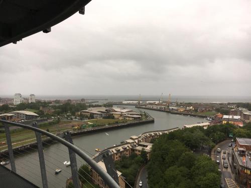 a view of a river from a bridge at City Centre Penthouse Apartment in Sunderland