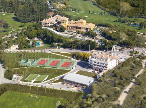 an aerial view of a building with a park at Hotel Golf Campoamor in Dehesa de Campoamor