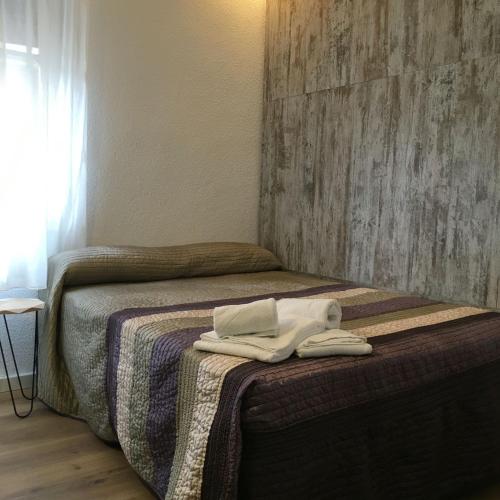 Postel nebo postele na pokoji v ubytování RoomConcept Hostel