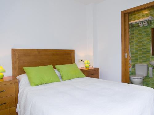 Ένα ή περισσότερα κρεβάτια σε δωμάτιο στο Pension Rustica Casa Do relojero