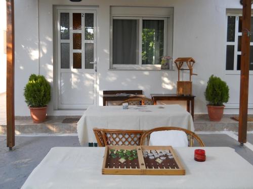 a table with a tray ofocolates on it on a patio at Villa Georgia in Potos