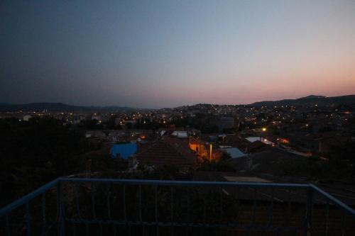 a view of a city at night at TAŞKONAK in Bergama