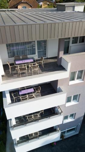 an aerial view of a building with a patio at Green Elite Residence in Sarajevo