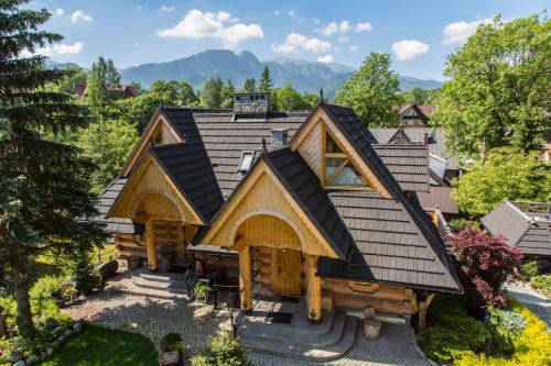an overhead view of a house with a gambrel roof at Chaty Zakopane in Zakopane
