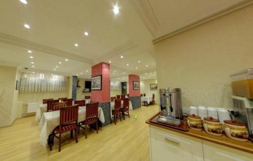 Kuchyň nebo kuchyňský kout v ubytování Hotel Akyildiz