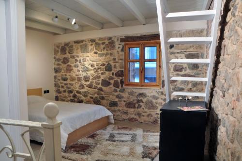 Area soggiorno di Limni Stone Apartments