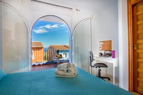 Ένα ή περισσότερα κρεβάτια σε δωμάτιο στο Bungalow la Cala
