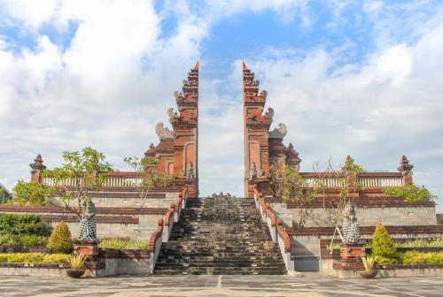 a stairway leading up to a temple at Novotel Bali Ngurah Rai Airport in Kuta