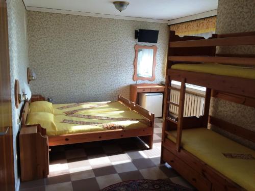 Poschodová posteľ alebo postele v izbe v ubytovaní Guesthouse JANA