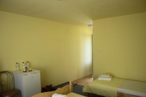 Daskalov Bungalowsにあるベッド