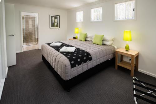 Ένα ή περισσότερα κρεβάτια σε δωμάτιο στο Wallsend Executive Apartments