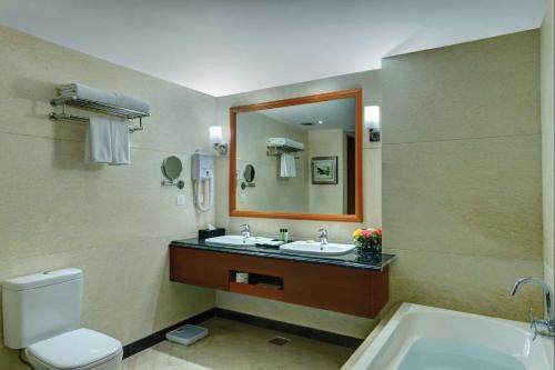 A bathroom at Ramada By Wyndham Amritsar