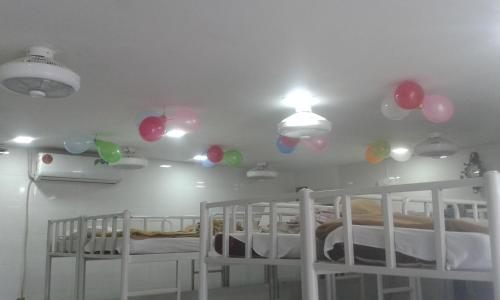 Postel nebo postele na pokoji v ubytování Star Dormitory