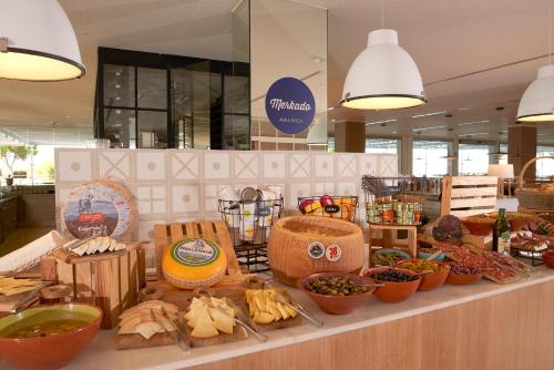 a display of food on a counter in a store at Meliá Calviá Beach in Magaluf