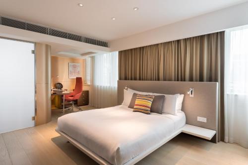 Katil atau katil-katil dalam bilik di Ovolo Central