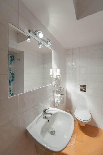 Koupelna v ubytování Hotel Garni Pod Skalkou