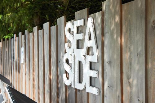 a sign that says sea salt on a wooden fence at Hotel Happy Filzmoos in Filzmoos