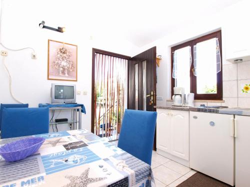 Televízia a/alebo spoločenská miestnosť v ubytovaní Apartments Kosovka 1398