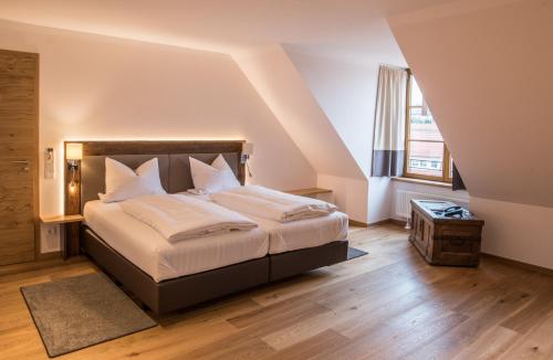 Ένα ή περισσότερα κρεβάτια σε δωμάτιο στο Brennereihotel Sponsel