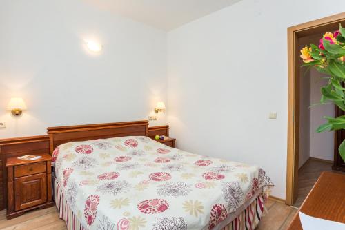 Postel nebo postele na pokoji v ubytování The Stream Resort