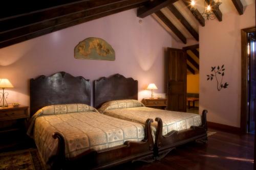 เตียงในห้องที่ Trisileja en Puente Romano