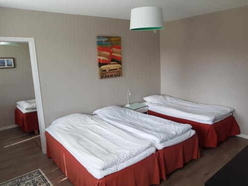 Łóżko lub łóżka w pokoju w obiekcie Hotel Tre Stockar