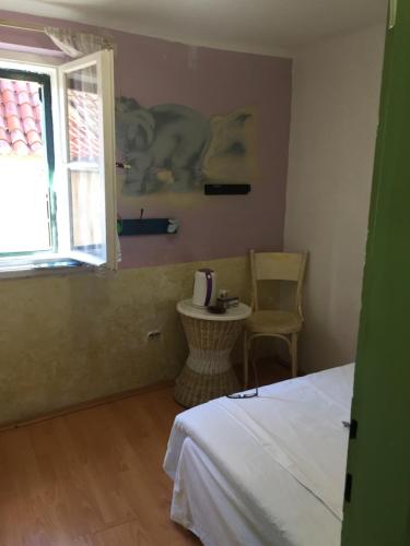 Cama ou camas em um quarto em Apartments Antonio Premi