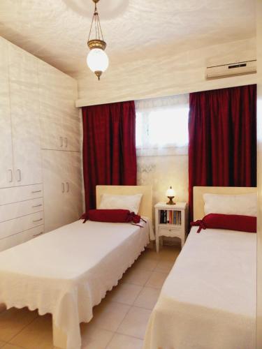 Postel nebo postele na pokoji v ubytování Skiathos Driades