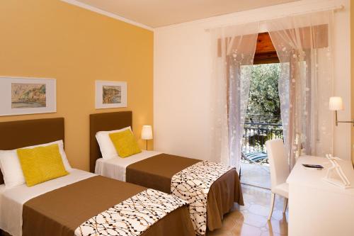 A bed or beds in a room at Il Nido del Gabbiano