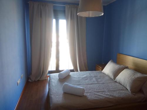 Кровать или кровати в номере Apartamento La Ermita Wifi