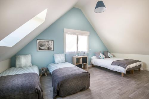 Postel nebo postele na pokoji v ubytování Gîte La Bourdonnaise