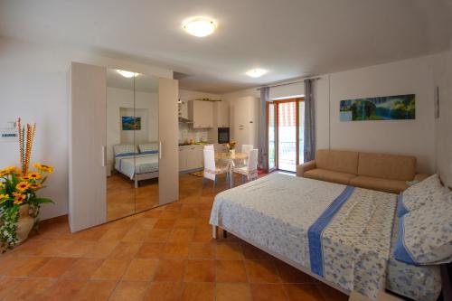 Ένα ή περισσότερα κρεβάτια σε δωμάτιο στο Case Vacanze Rossi