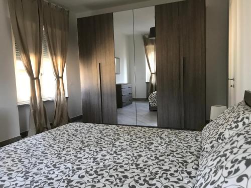 Katil atau katil-katil dalam bilik di Home Hotel