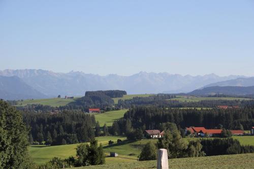 a view of a valley with mountains in the background at Landhaus Sommerau in Buchenberg